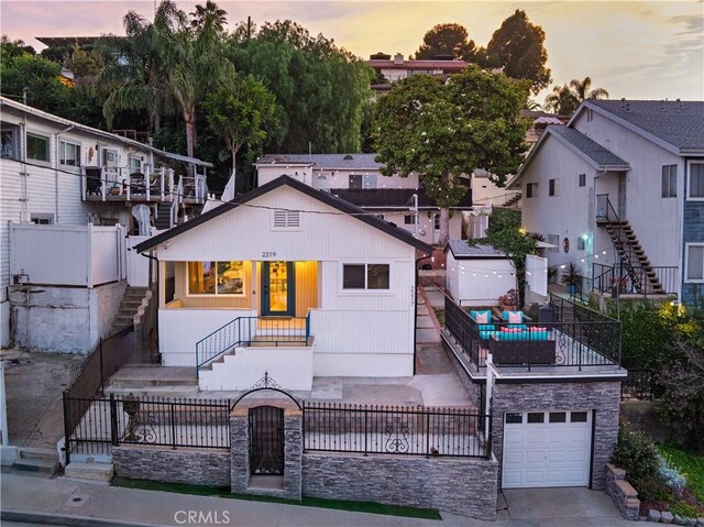 2217 S Gaffey St, San Pedro, CA 90731 - view of front of home featuring stairway and concrete driveway