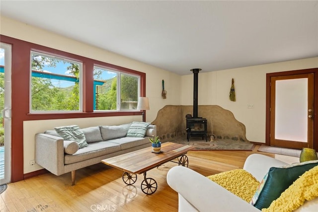 5338 Deception River Rd, Chico, CA 95928 - living area with a wood stove and light wood finished floors