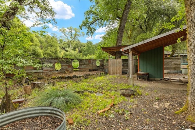 5338 Deception River Rd, Chico, CA 95928 - view of yard with an outdoor structure and fence