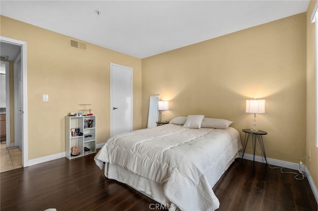 2045 Las Colinas Cir Unit 103, Corona, CA 92879 - bedroom featuring wood finished floors and baseboards
