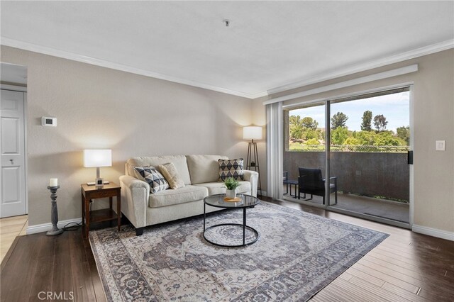 2045 Las Colinas Cir Unit 103, Corona, CA 92879 - living room featuring ornamental molding, hardwood / wood-style flooring, and baseboards
