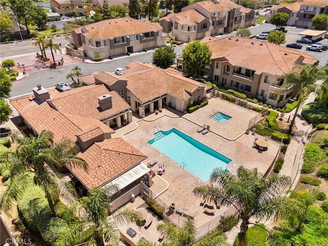 2045 Las Colinas Cir Unit 103, Corona, CA 92879 - aerial perspective of suburban area with a pool