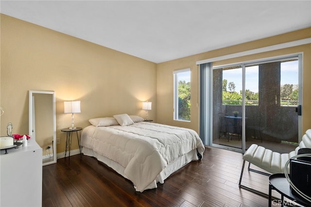 2045 Las Colinas Cir Unit 103, Corona, CA 92879 - bedroom with access to outside, dark wood-style floors, and baseboards