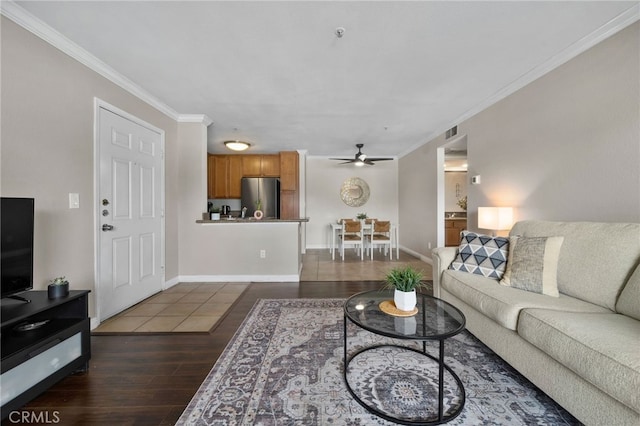 2045 Las Colinas Cir Unit 103, Corona, CA 92879 - living area with ceiling fan, dark wood-style flooring, ornamental molding, and baseboards