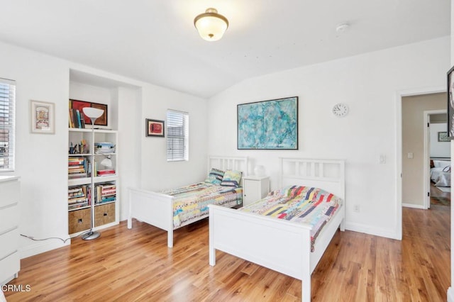 856 E Rio Grande St, Pasadena, CA 91104 - bedroom featuring light wood-style floors, vaulted ceiling, and baseboards