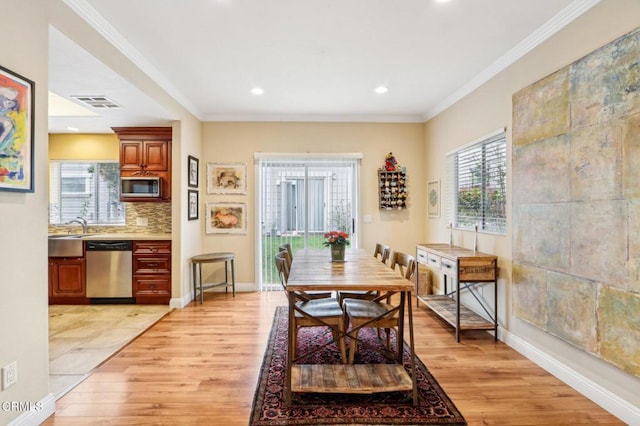 856 E Rio Grande St, Pasadena, CA 91104 - dining area with light wood-style floors, ornamental molding, recessed lighting, and baseboards