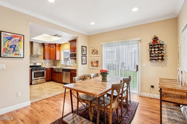 856 E Rio Grande St, Pasadena, CA 91104 - dining area with light wood-style floors, ornamental molding, recessed lighting, and baseboards