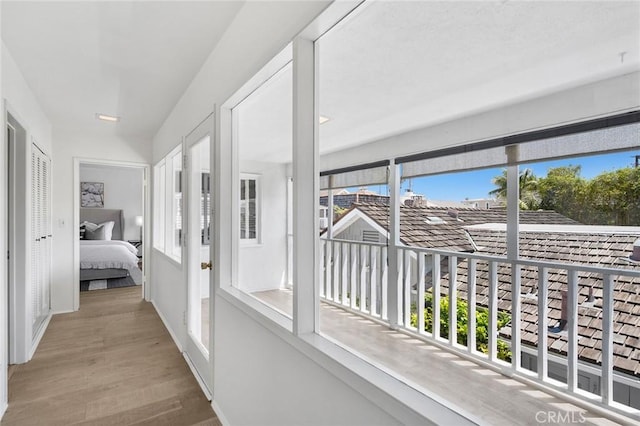 121 Onyx Ave, Newport Beach, CA 92662 - unfurnished sunroom with healthy amount of natural light, wood finished floors, and baseboards