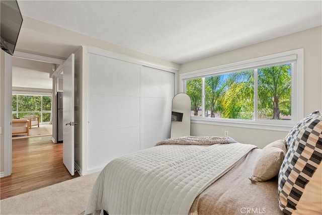 780P Via Los Altos, Laguna Woods, CA 92637 - bedroom with a closet, carpet flooring, and baseboards