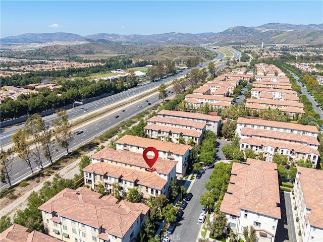 aerial perspective of suburban area with mountains