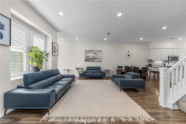135 Neptune, Irvine, CA 92618 - living room featuring recessed lighting, dark wood-style floors, and stairs