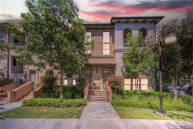 135 Neptune, Irvine, CA 92618 - view of front facade with stucco siding