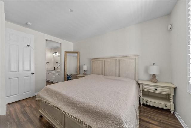 135 Neptune, Irvine, CA 92618 - bedroom with dark wood-type flooring and connected bathroom