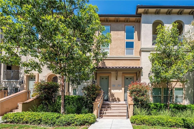 135 Neptune, Irvine, CA 92618 - view of property with stucco siding