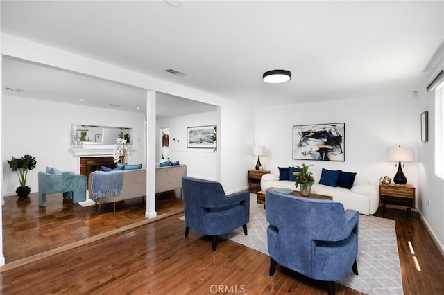 810 W Rte 66, Glendora, CA 91740 - living area featuring wood finished floors, a fireplace, and baseboards