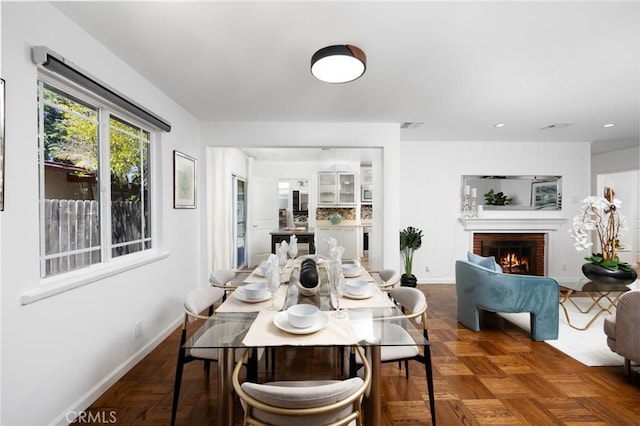 810 W Rte 66, Glendora, CA 91740 - dining space with baseboards and a brick fireplace