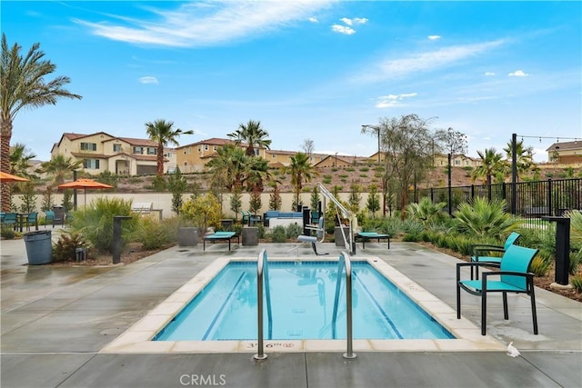 36936 Buccella Ln, Beaumont, CA 92223 - view of swimming pool with a patio, a swimming pool, and a fenced backyard