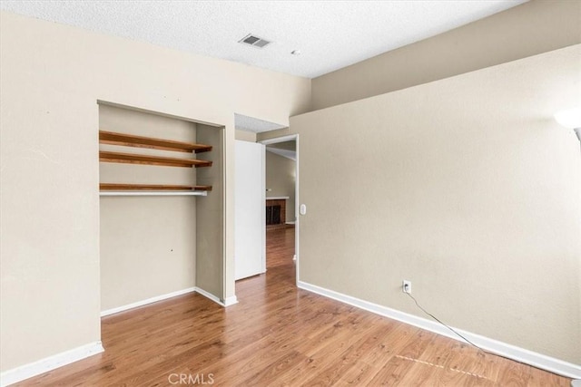 1866 Overland St, Colton, CA 92324 - unfurnished bedroom with wood finished floors, a closet, and lofted ceiling