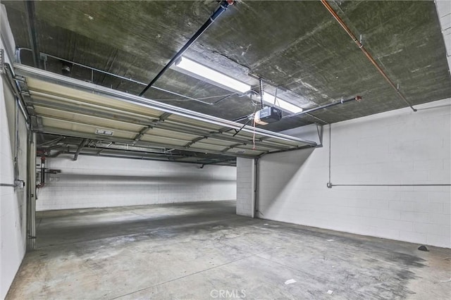 547 N Wilson Ave Unit 2, Pasadena, CA 91106 - parking garage with a garage door opener and concrete block wall