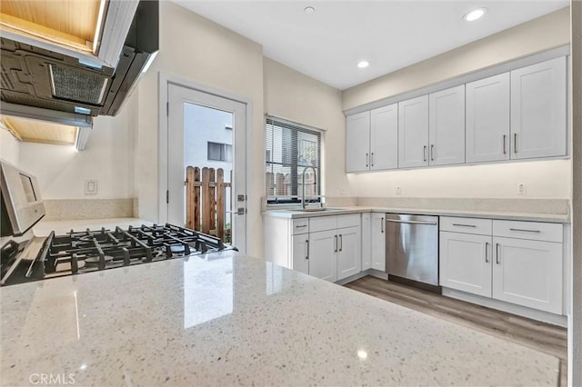 547 N Wilson Ave Unit 2, Pasadena, CA 91106 - kitchen with dishwasher, a sink, light stone countertops, white cabinetry, and recessed lighting
