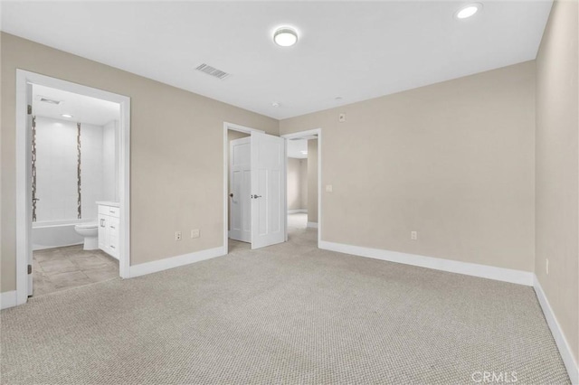 547 N Wilson Ave Unit 2, Pasadena, CA 91106 - unfurnished bedroom with carpet, baseboards, connected bathroom, and recessed lighting