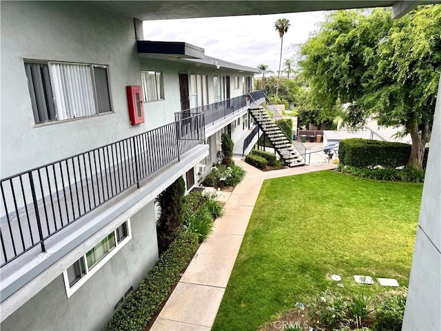 136 W Union Ave, Fullerton, CA 92832 - view of grassy yard featuring stairway and a balcony
