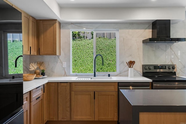 4687 Murat Ct, San Diego, CA 92117 - kitchen with exhaust hood, stainless steel electric range, tasteful backsplash, brown cabinetry, and healthy amount of natural light