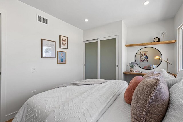 4687 Murat Ct, San Diego, CA 92117 - bedroom with recessed lighting and a closet