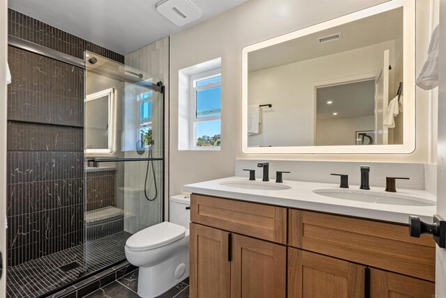 4687 Murat Ct, San Diego, CA 92117 - full bath with double vanity, a stall shower, and marble finish flooring