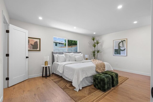 4687 Murat Ct, San Diego, CA 92117 - bedroom with recessed lighting and light wood finished floors