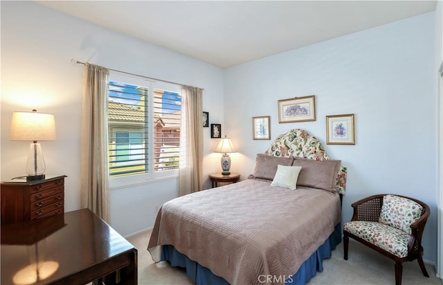 5126 E Paddington Ct Unit F, Orange, CA 92867 - bedroom with light carpet and baseboards