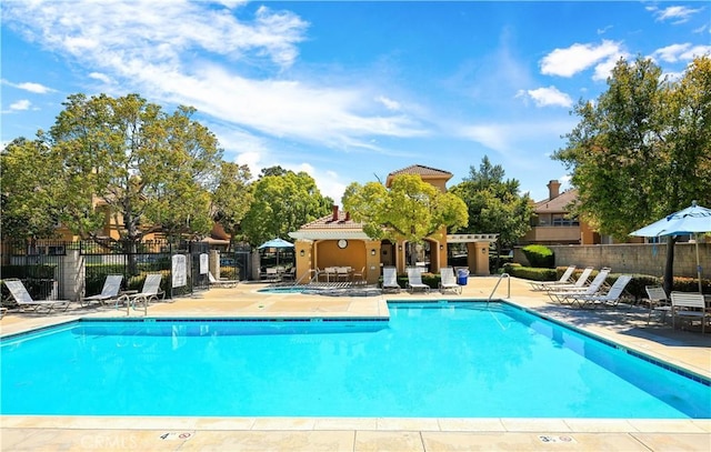 5126 E Paddington Ct Unit F, Orange, CA 92867 - community pool with fence and a patio
