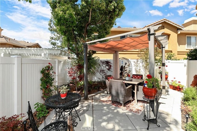 5126 E Paddington Ct Unit F, Orange, CA 92867 - view of patio / terrace with a pergola, a fenced backyard, and outdoor dining area