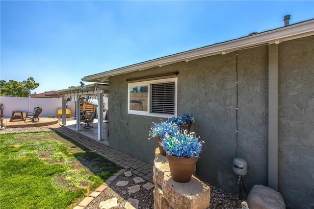 9914 Albany Ave, Rancho Cucamonga, CA 91701 - view of side of home featuring a patio and stucco siding