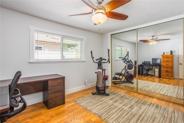 9914 Albany Ave, Rancho Cucamonga, CA 91701 - workout room with healthy amount of natural light, wood finished floors, baseboards, and a ceiling fan