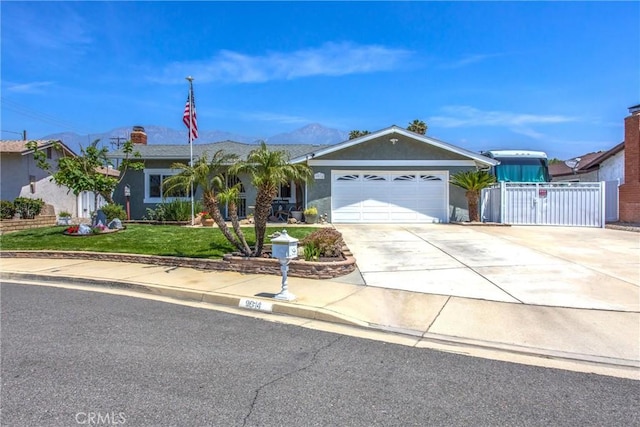 9914 Albany Ave, Rancho Cucamonga, CA 91701 - single story home featuring concrete driveway, a garage, a mountain view, and stucco siding