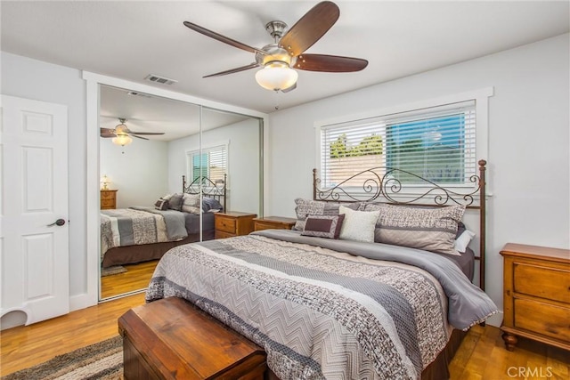9914 Albany Ave, Rancho Cucamonga, CA 91701 - bedroom with wood finished floors, a closet, and a ceiling fan