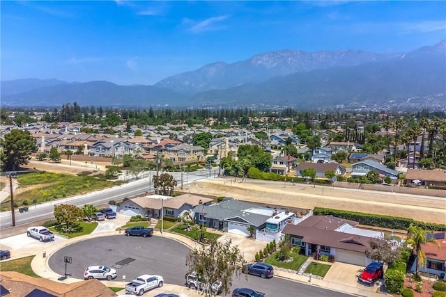 9914 Albany Ave, Rancho Cucamonga, CA 91701 - aerial perspective of suburban area featuring a mountainous background