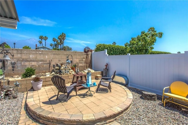 9914 Albany Ave, Rancho Cucamonga, CA 91701 - fenced backyard featuring a patio area and a mountain view