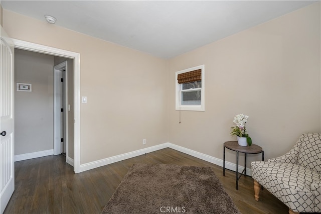 2731 N Rutgers Ave, Long Beach, CA 90815 - living area with baseboards and wood finished floors