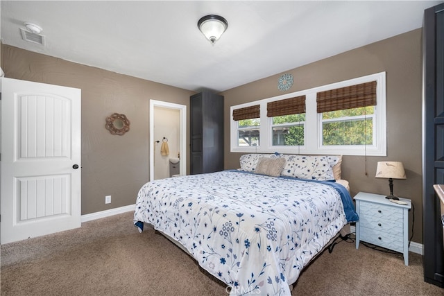 2731 N Rutgers Ave, Long Beach, CA 90815 - carpeted bedroom with baseboards and ensuite bathroom