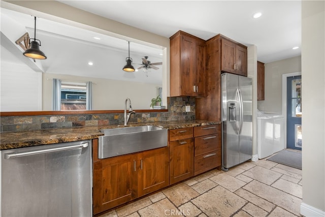 2731 N Rutgers Ave, Long Beach, CA 90815 - kitchen featuring stainless steel appliances, a sink, washer / dryer, stone tile flooring, and recessed lighting