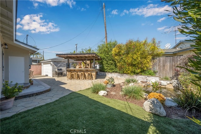 2731 N Rutgers Ave, Long Beach, CA 90815 - view of yard with an outdoor structure and a patio area