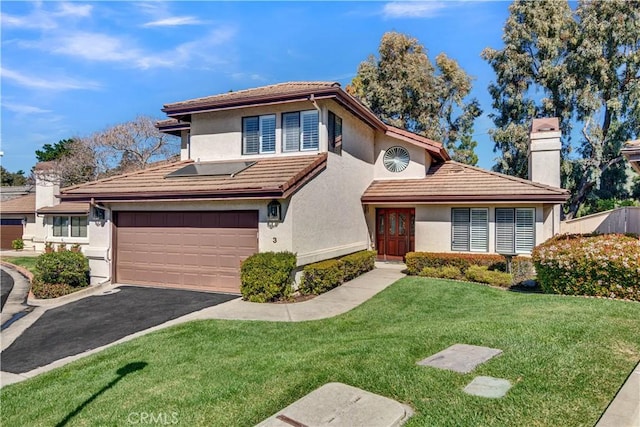 1490 Descanso St Unit 3, San Luis Obispo, CA 93405 - view of front facade with a tiled roof, stucco siding, an attached garage, and asphalt driveway