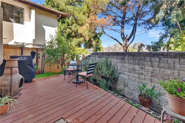 1490 Descanso St Unit 3, San Luis Obispo, CA 93405 - wooden deck with a fenced backyard and outdoor dining space