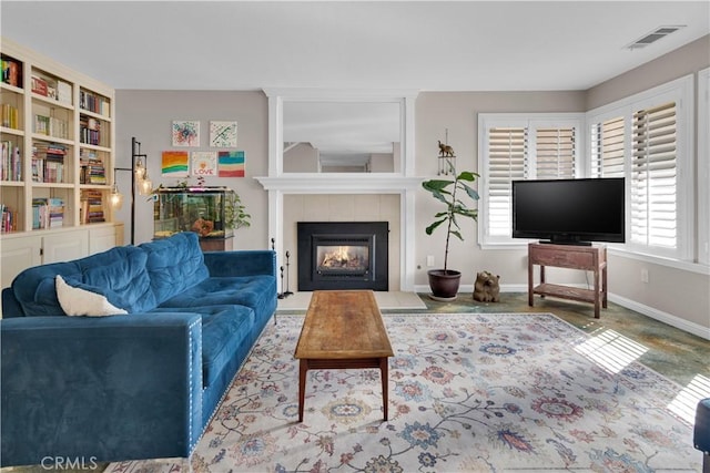 1490 Descanso St Unit 3, San Luis Obispo, CA 93405 - living room featuring plenty of natural light, baseboards, and a tile fireplace