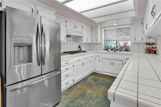 1490 Descanso St Unit 3, San Luis Obispo, CA 93405 - kitchen featuring appliances with stainless steel finishes, tile counters, a sink, under cabinet range hood, and finished concrete flooring