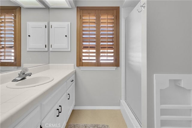 1490 Descanso St Unit 3, San Luis Obispo, CA 93405 - bathroom with vanity, plenty of natural light, a shower, and baseboards