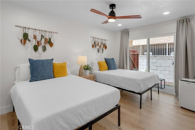 1075 Molino Ave Unit D, Long Beach, CA 90804 - bedroom featuring light wood finished floors, recessed lighting, a ceiling fan, and access to outside