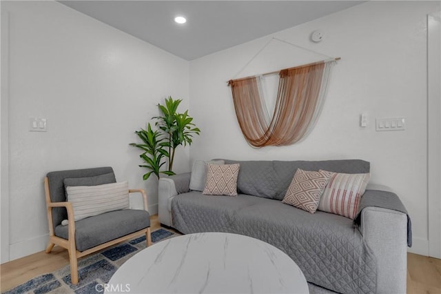 1075 Molino Ave Unit D, Long Beach, CA 90804 - sitting room with wood finished floors, recessed lighting, and baseboards